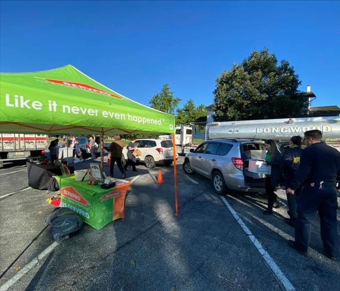cars and volunteers for shredding event