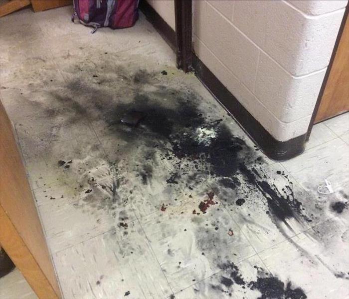 fire extinguisher residue on school floor